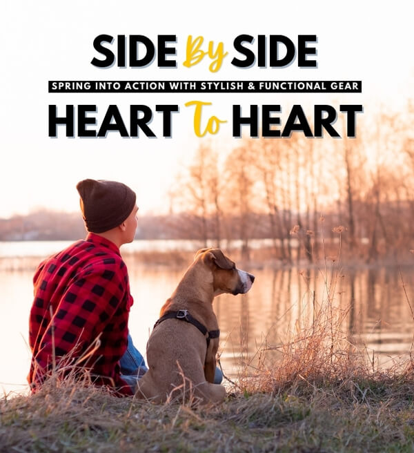 Dog & Owner sitting by a lake - Text reads 'Side By Side, Heart to Heart. Spring Into action with stylish and functional gear.'